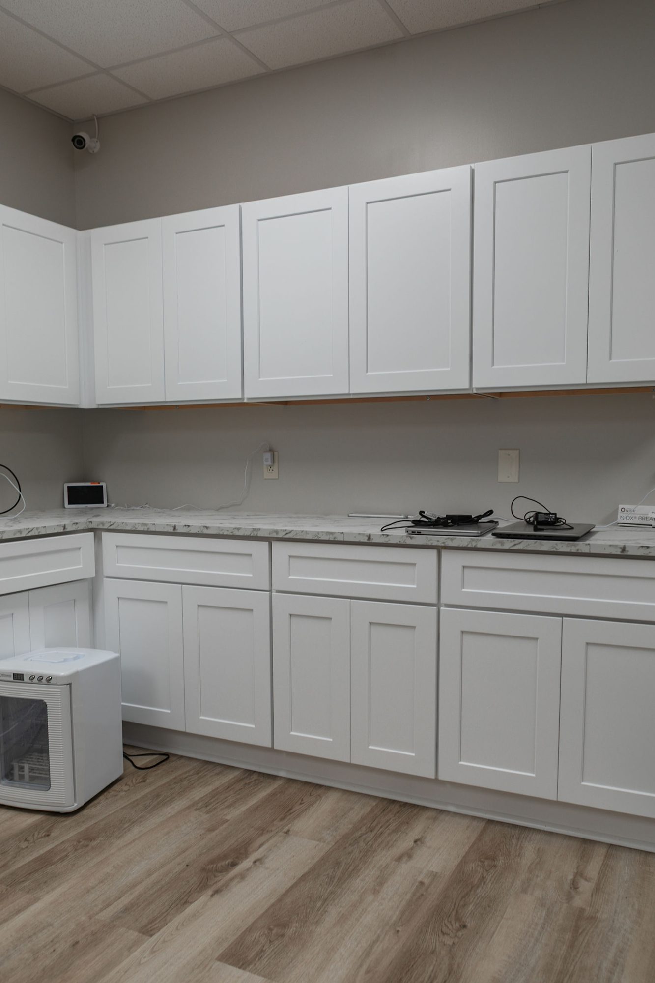 Break room with white shaker cabinetry in an Indianapolis-area commercial build-out