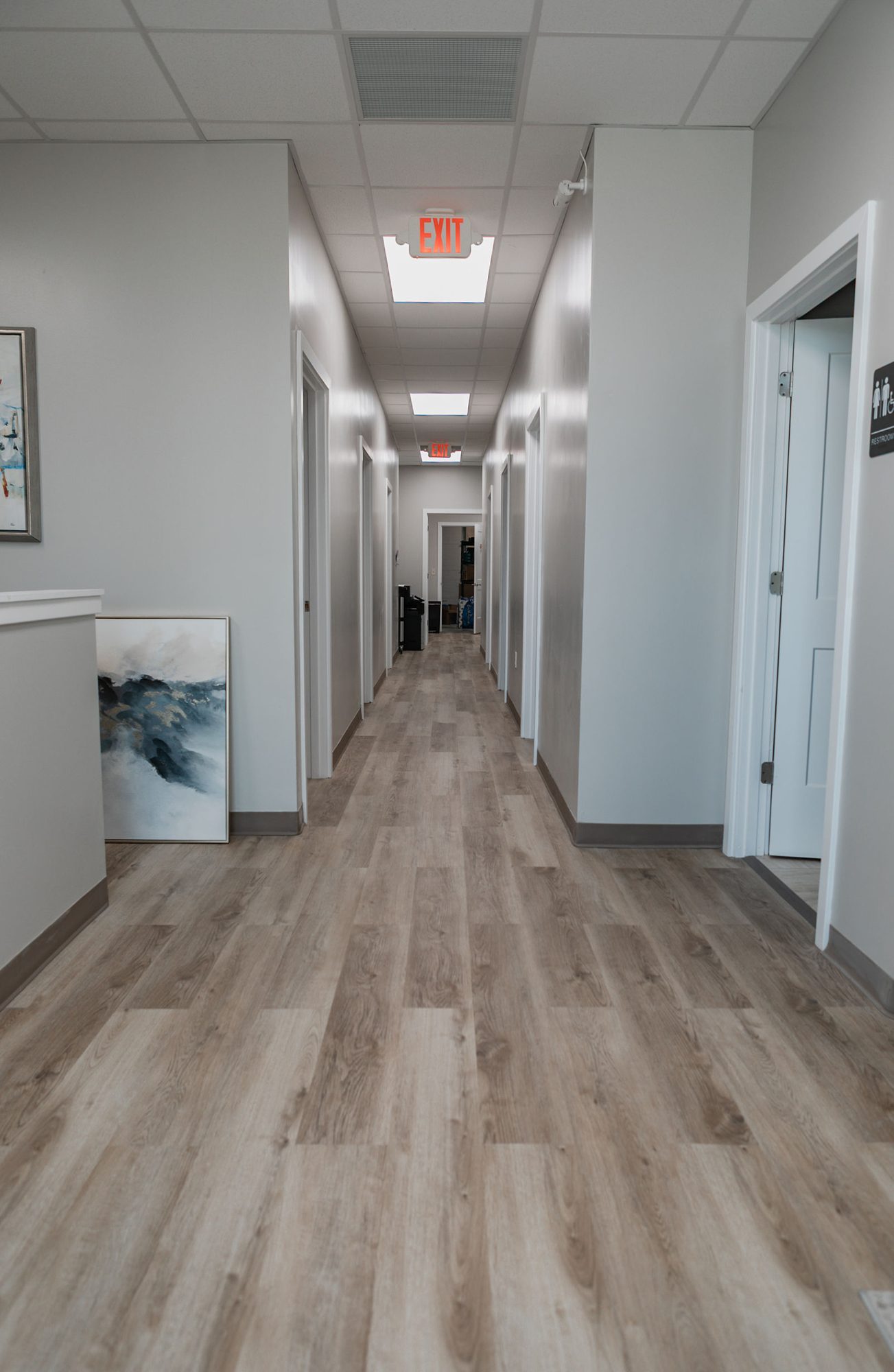 Finished corridor with luxury vinyl plank flooring in an Indianapolis-area commercial build-out