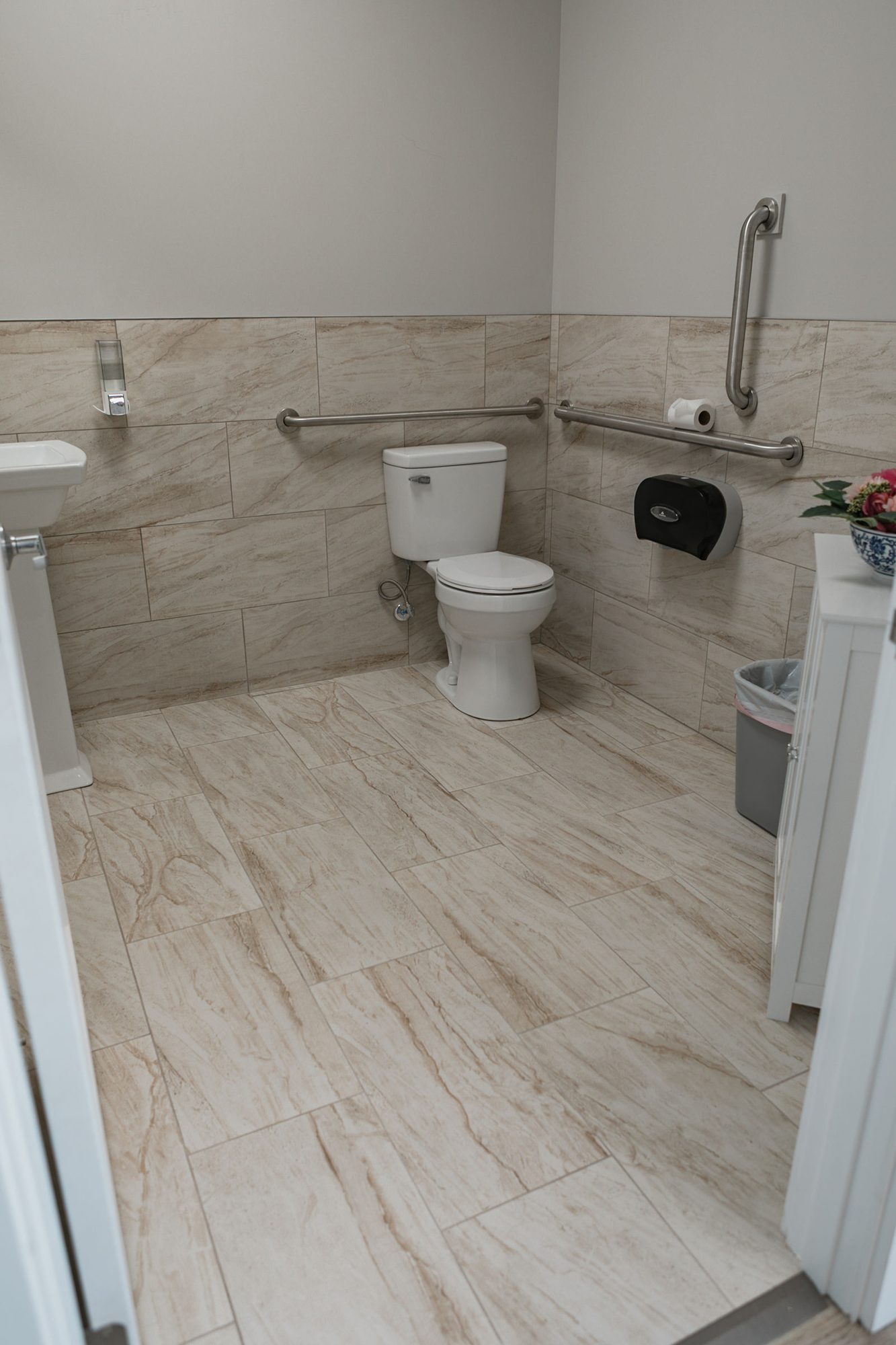 Tiled accessible restroom in an Indianapolis-area commercial build-out
